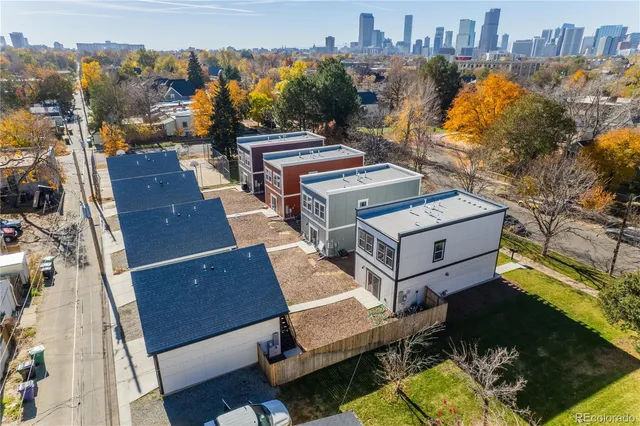 an aerial view of a house with a garden