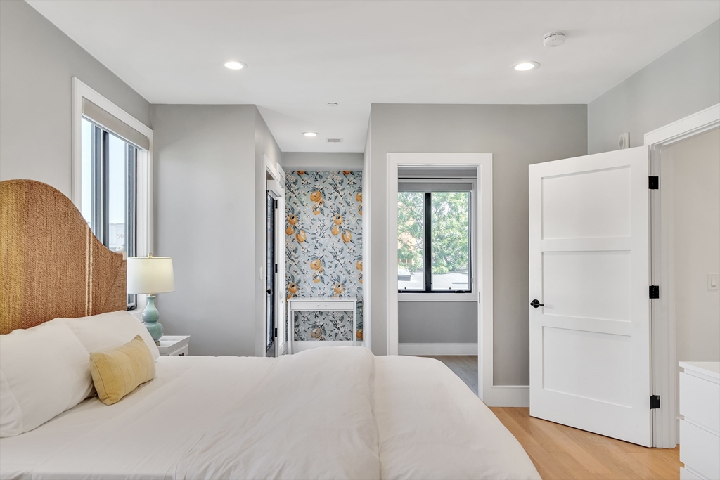 148 West 9th Street, Unit 6 Boston, MA 02127 - Photo 11 of 21 a bedroom with a bed and a window