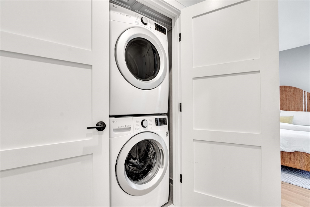 148 West 9th Street, Unit 6 Boston, MA 02127 - Photo 18 of 21 a utility room with dryer and washer
