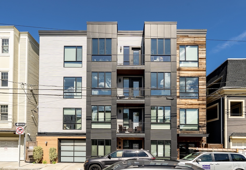 148 West 9th Street, Unit 6 Boston, MA 02127 - Photo 20 of 21 a front view of a multi story building