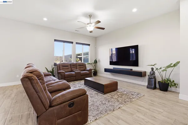 a bathroom with a tub shower and sink