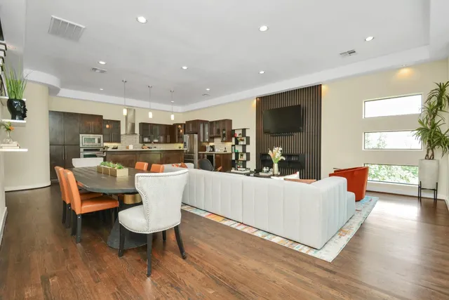 a living room with furniture and a table