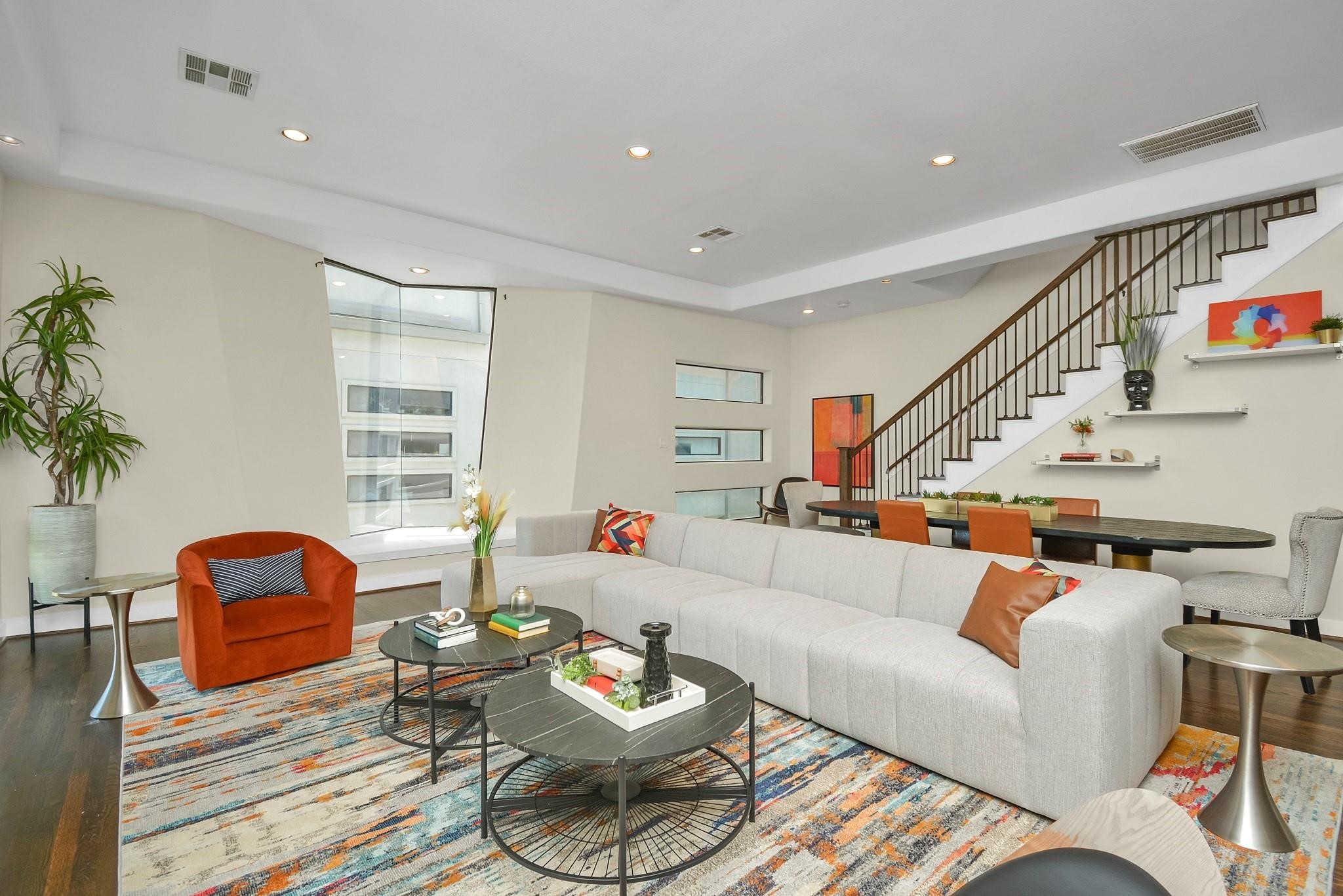 4608 Nett Street, Unit D Houston, TX 77007 - Photo 16 of 47 a living room with furniture a rug and a window