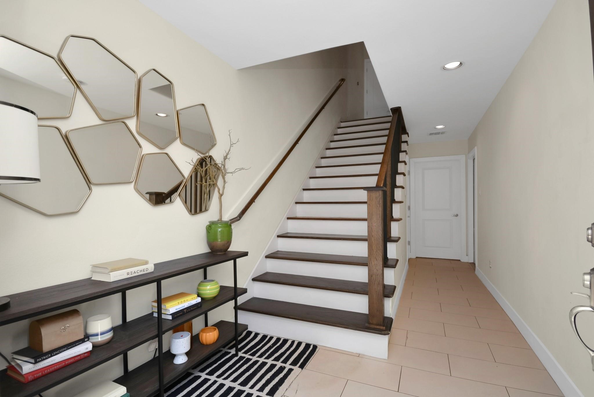 4608 Nett Street, Unit D Houston, TX 77007 - Photo 2 of 47 a view of entryway and hall with wooden floor