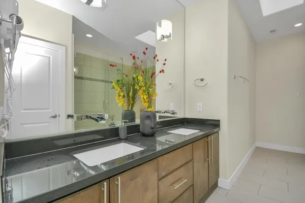 a bathroom with a sink and a mirror