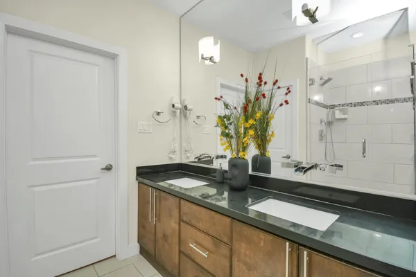 a bathroom with a sink and a mirror