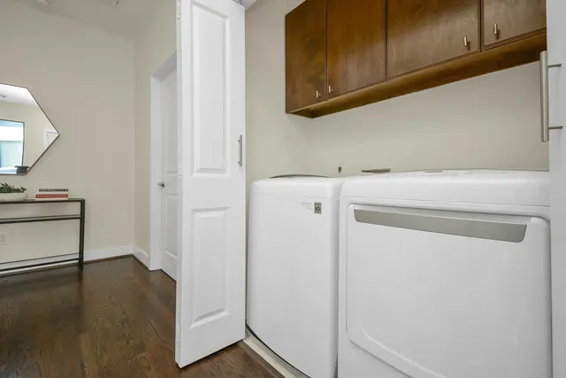 a utility room with dryer and washer