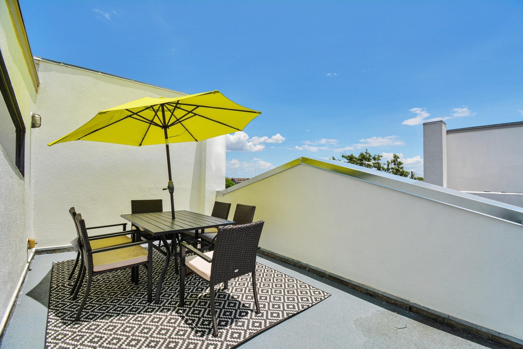 4608 Nett Street, Unit D Houston, TX 77007 - Photo 43 of 47 a view of a dining room with furniture and wooden floor