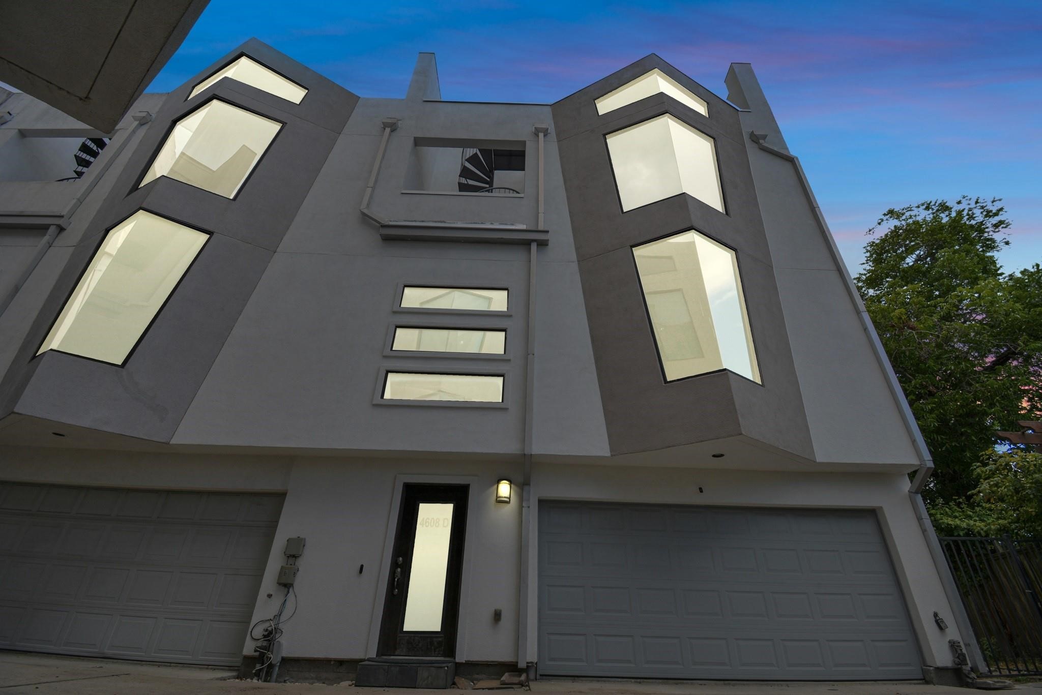 4608 Nett Street, Unit D Houston, TX 77007 - Photo 46 of 47 a view of staircase with a mirror