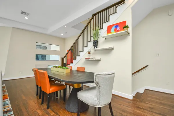 a view of dining room and hall with furniture