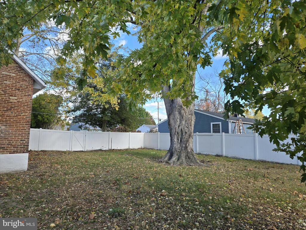 524 8th Avenue Lindenwold, NJ 08021 - Photo 22 of 22 a view of a house with a tree and a yard
