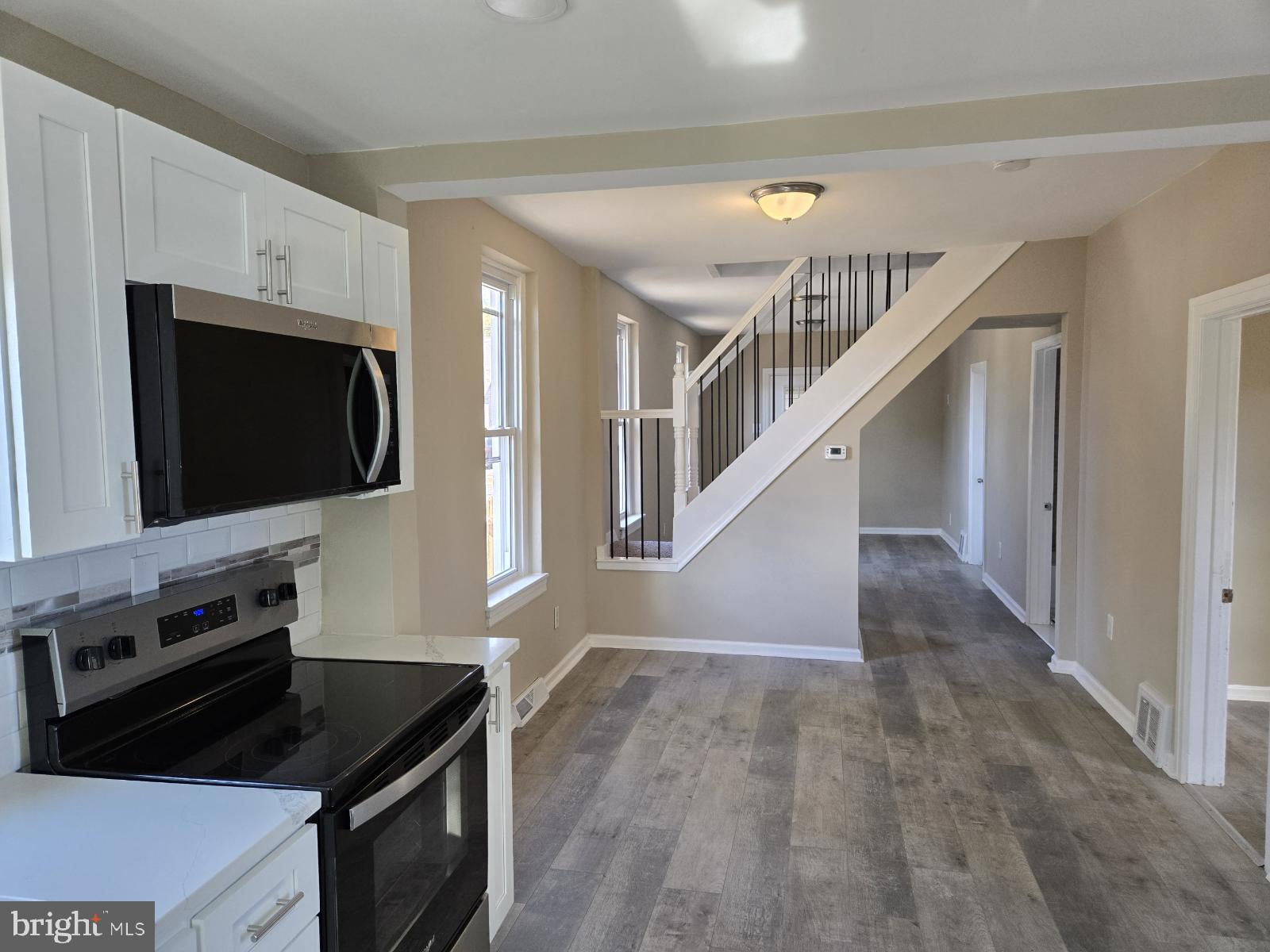 524 8th Avenue Lindenwold, NJ 08021 - Photo 9 of 22 a living room with furniture and a flat screen tv