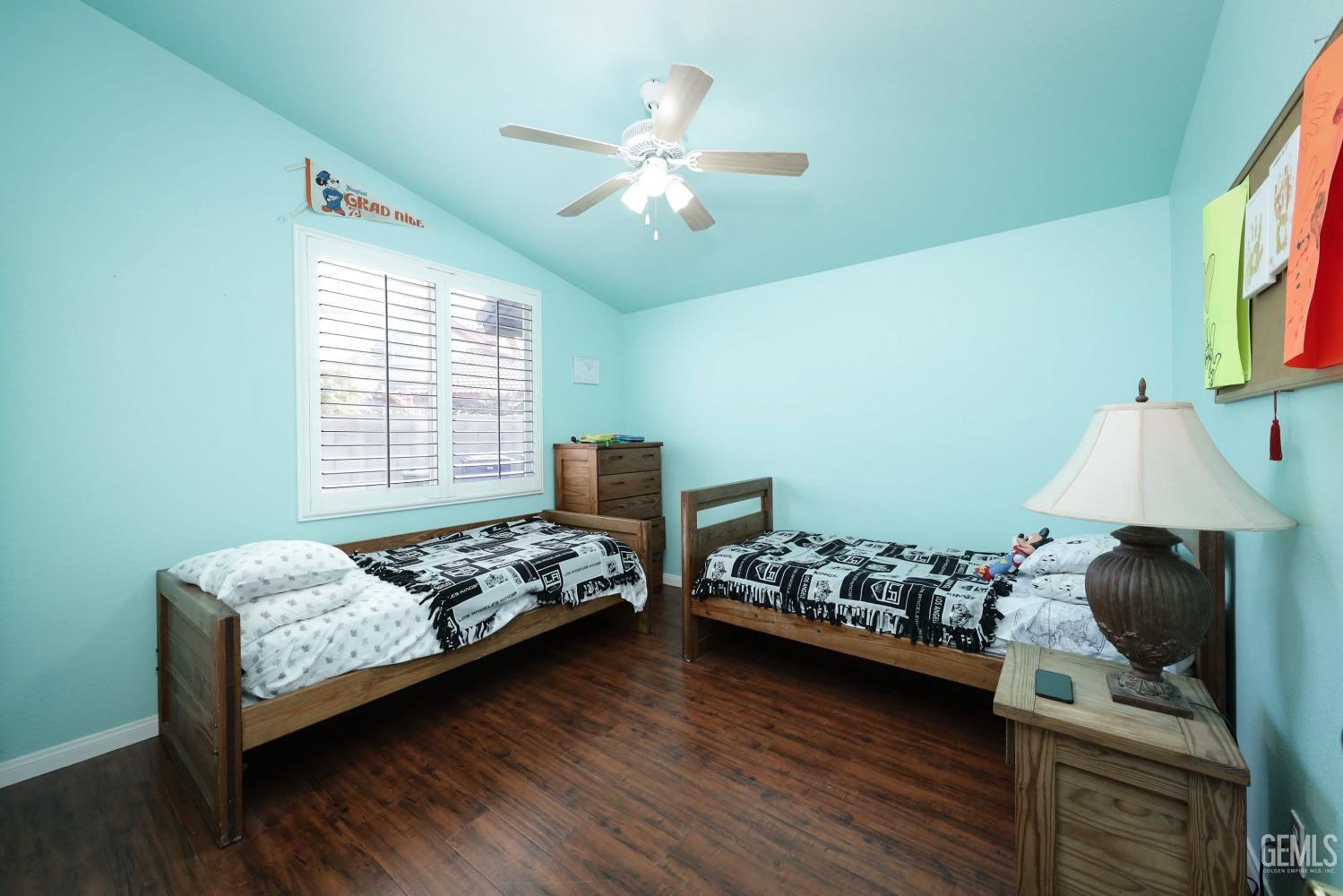 Undisclosed Address Bakersfield, CA 93312 - Photo 18 of 38 a bedroom with bed and a window