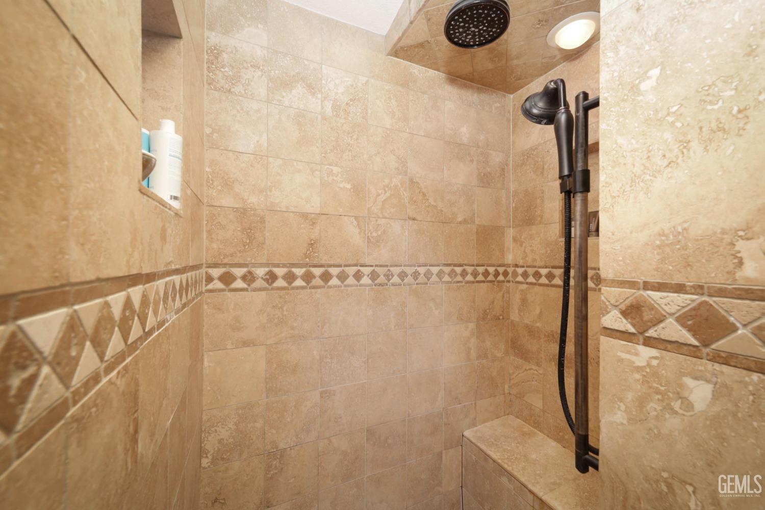 Undisclosed Address Bakersfield, CA 93312 - Photo 24 of 38 a bathroom with a shower