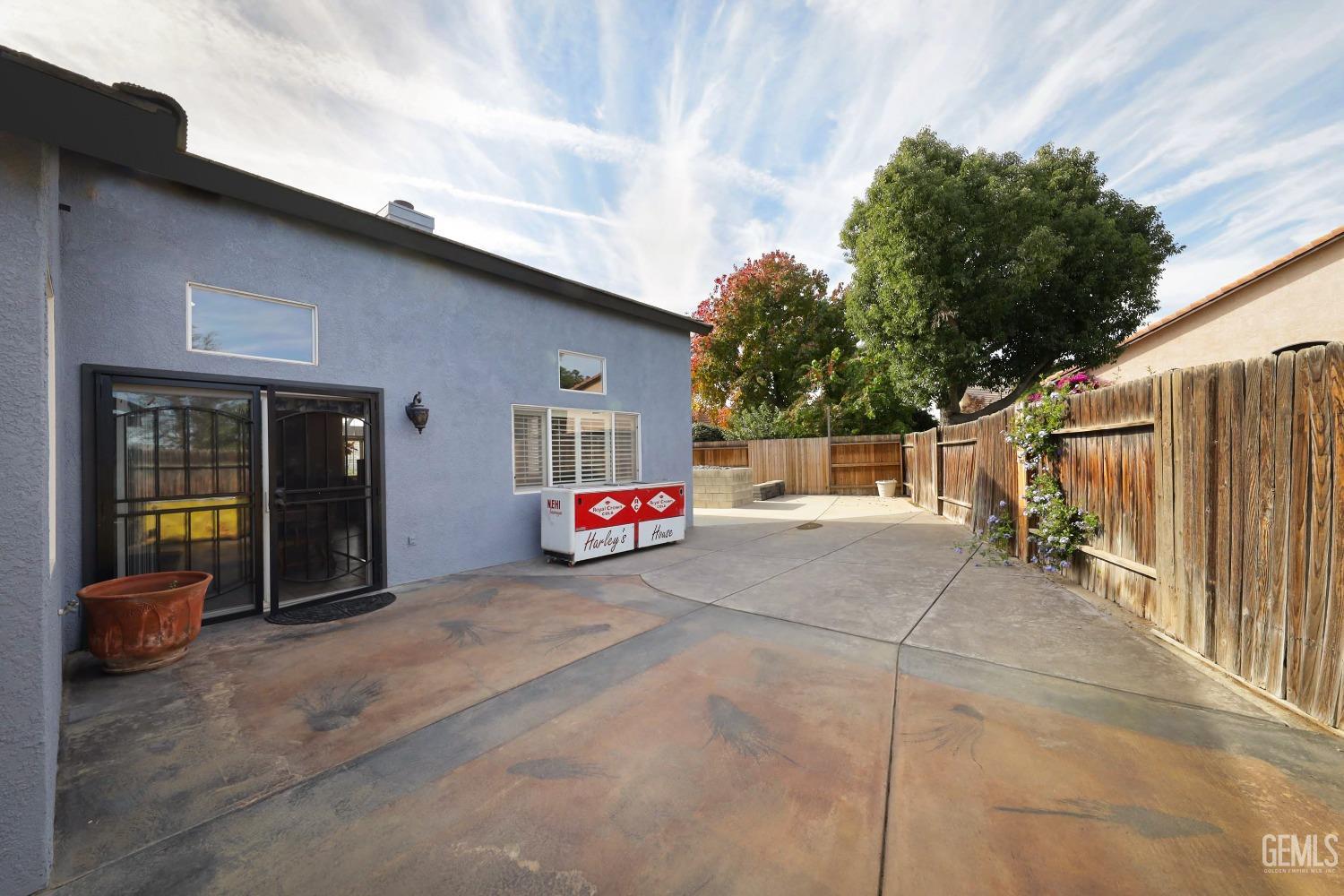 Undisclosed Address Bakersfield, CA 93312 - Photo 27 of 38 a view of a house with backyard and sitting area