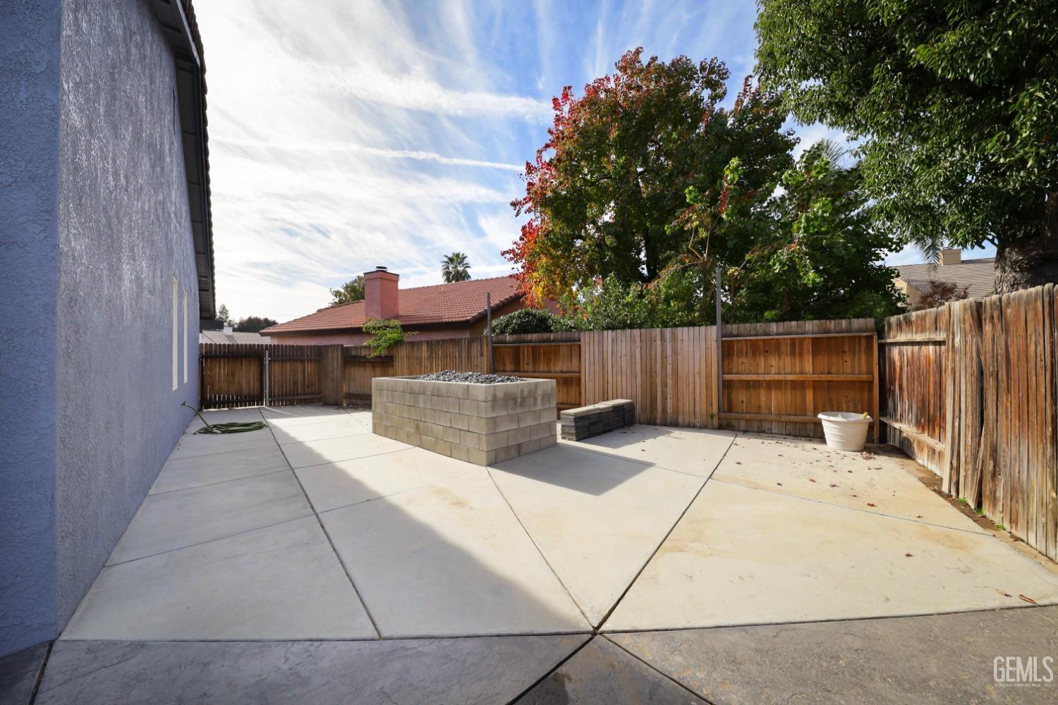 Undisclosed Address Bakersfield, CA 93312 - Photo 28 of 38 a view of a backyard with sitting area