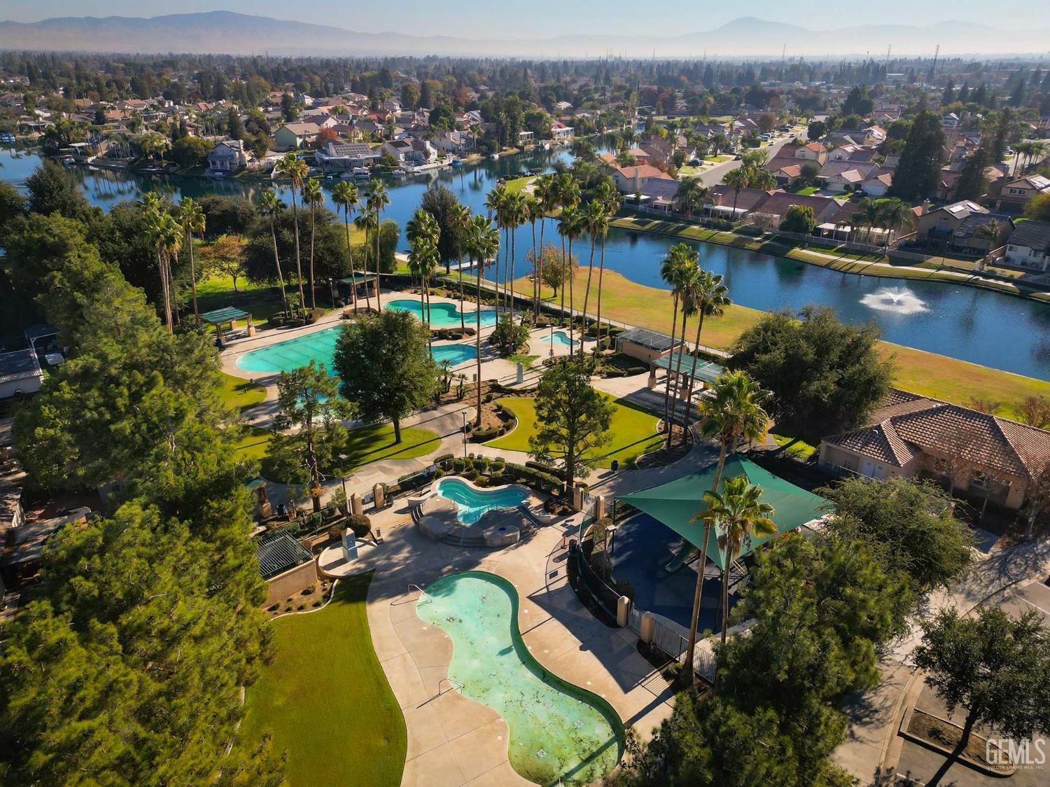 Undisclosed Address Bakersfield, CA 93312 - Photo 36 of 38 an aerial view of residential houses with outdoor space and lake view