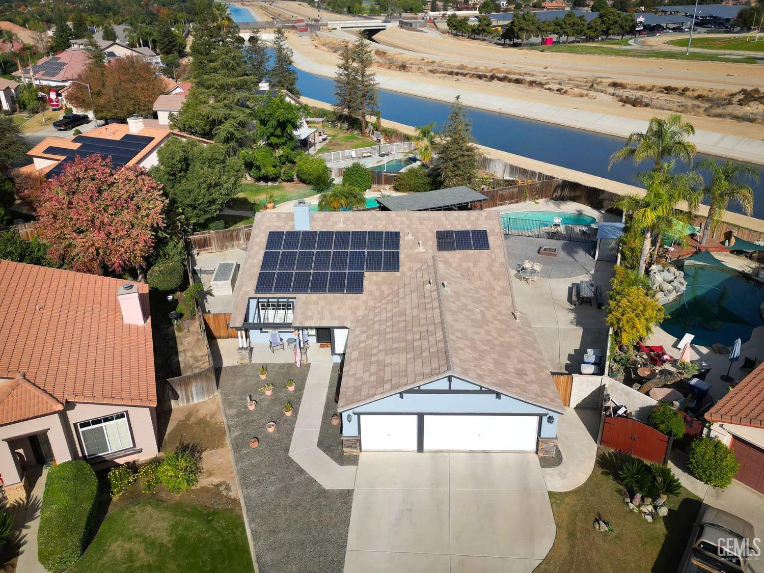 Undisclosed Address Bakersfield, CA 93312 - Photo 5 of 38 an aerial view of a house with outdoor space