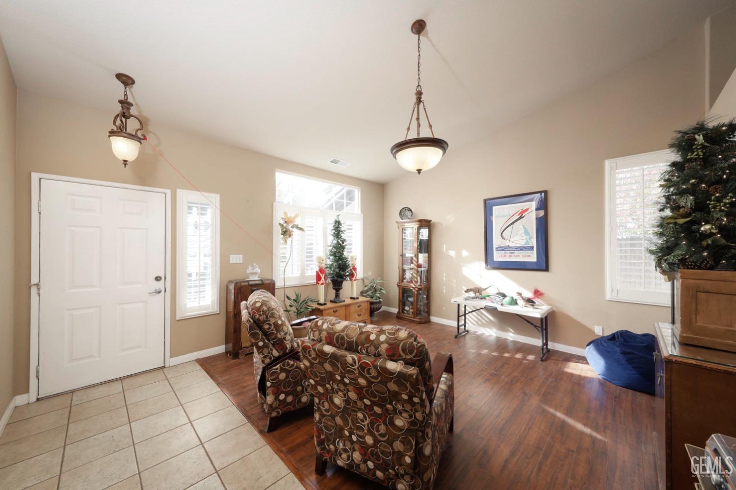 Undisclosed Address Bakersfield, CA 93312 - Photo 10 of 38 a living room with furniture