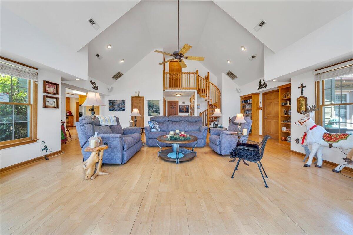 531 Brookwood Road Wirtz, VA 24184 - Photo 14 of 57 a living room with furniture and a chandelier