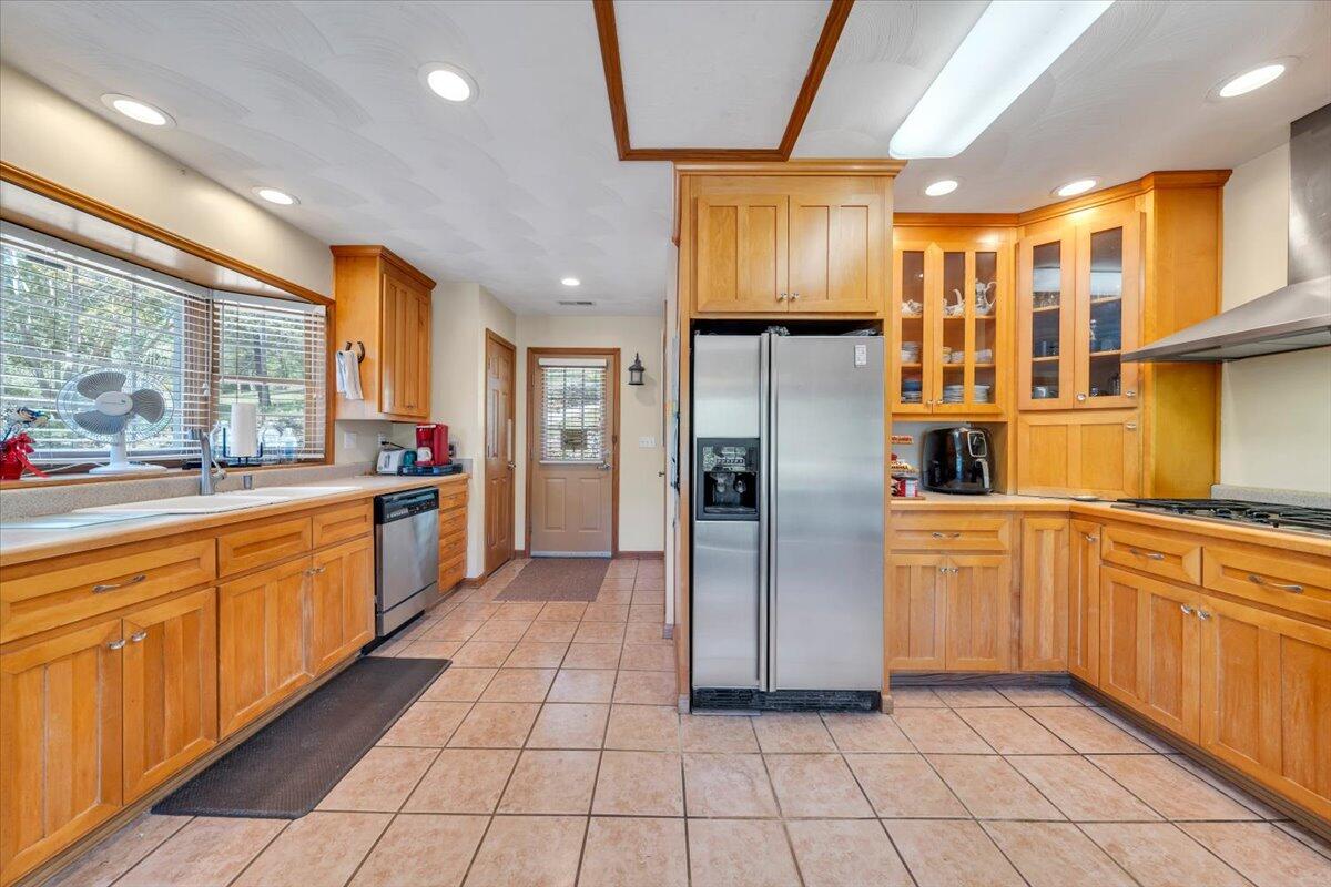 531 Brookwood Road Wirtz, VA 24184 - Photo 17 of 57 a kitchen with stainless steel appliances granite countertop a refrigerator and a sink