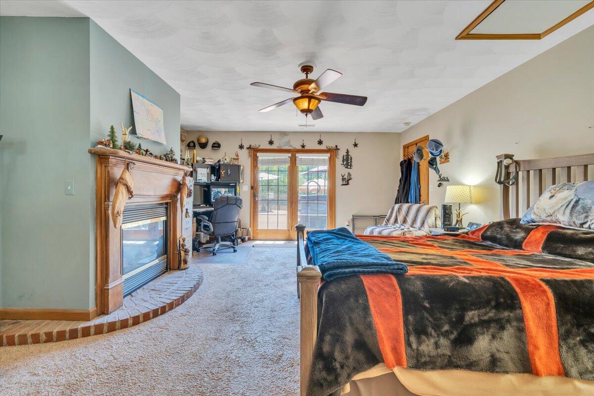 531 Brookwood Road Wirtz, VA 24184 - Photo 27 of 57 a bedroom with a bed and a mirror