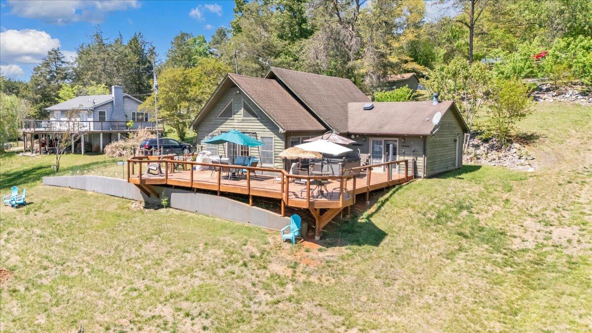 531 Brookwood Road Wirtz, VA 24184 - Photo 3 of 57 an aerial view of a house with swimming pool garden view and a small yard