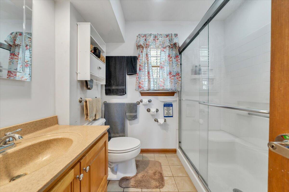 531 Brookwood Road Wirtz, VA 24184 - Photo 35 of 57 a bathroom with a sink toilet and shower