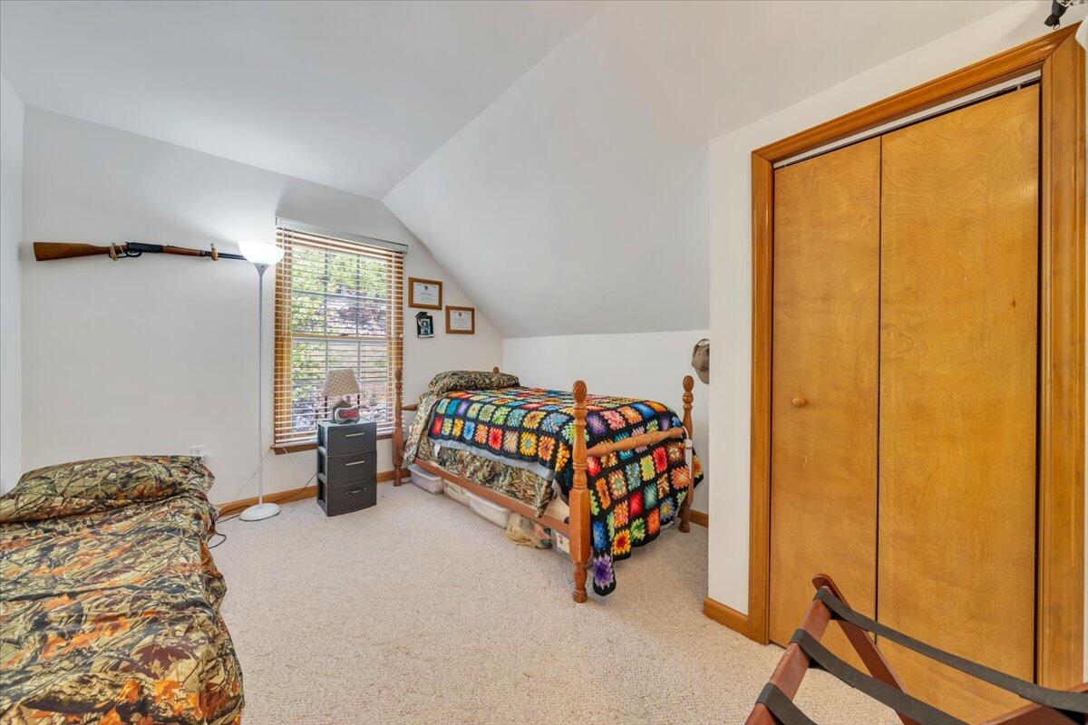 531 Brookwood Road Wirtz, VA 24184 - Photo 37 of 57 a bedroom with a bed and a window