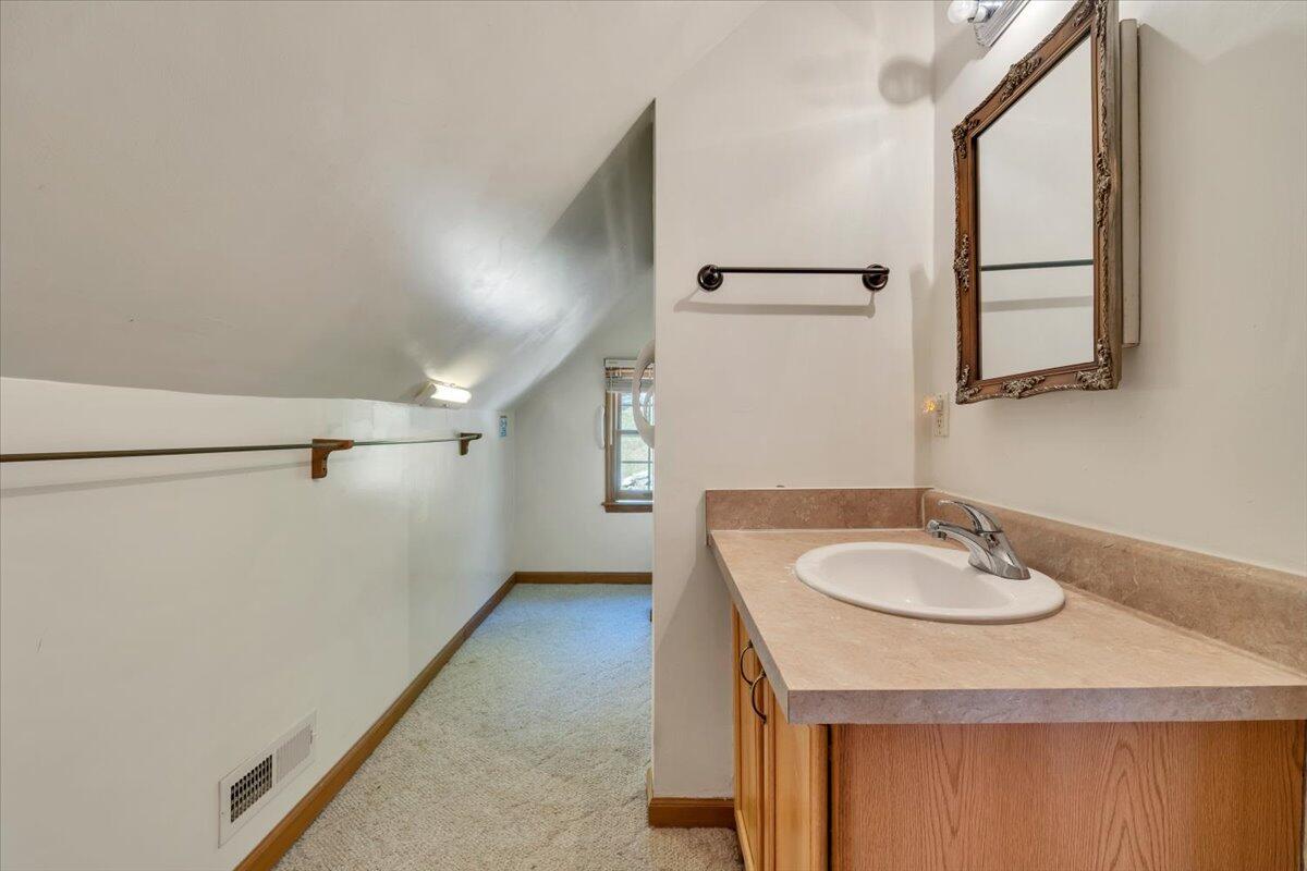 531 Brookwood Road Wirtz, VA 24184 - Photo 39 of 57 a bathroom with a sink and a mirror