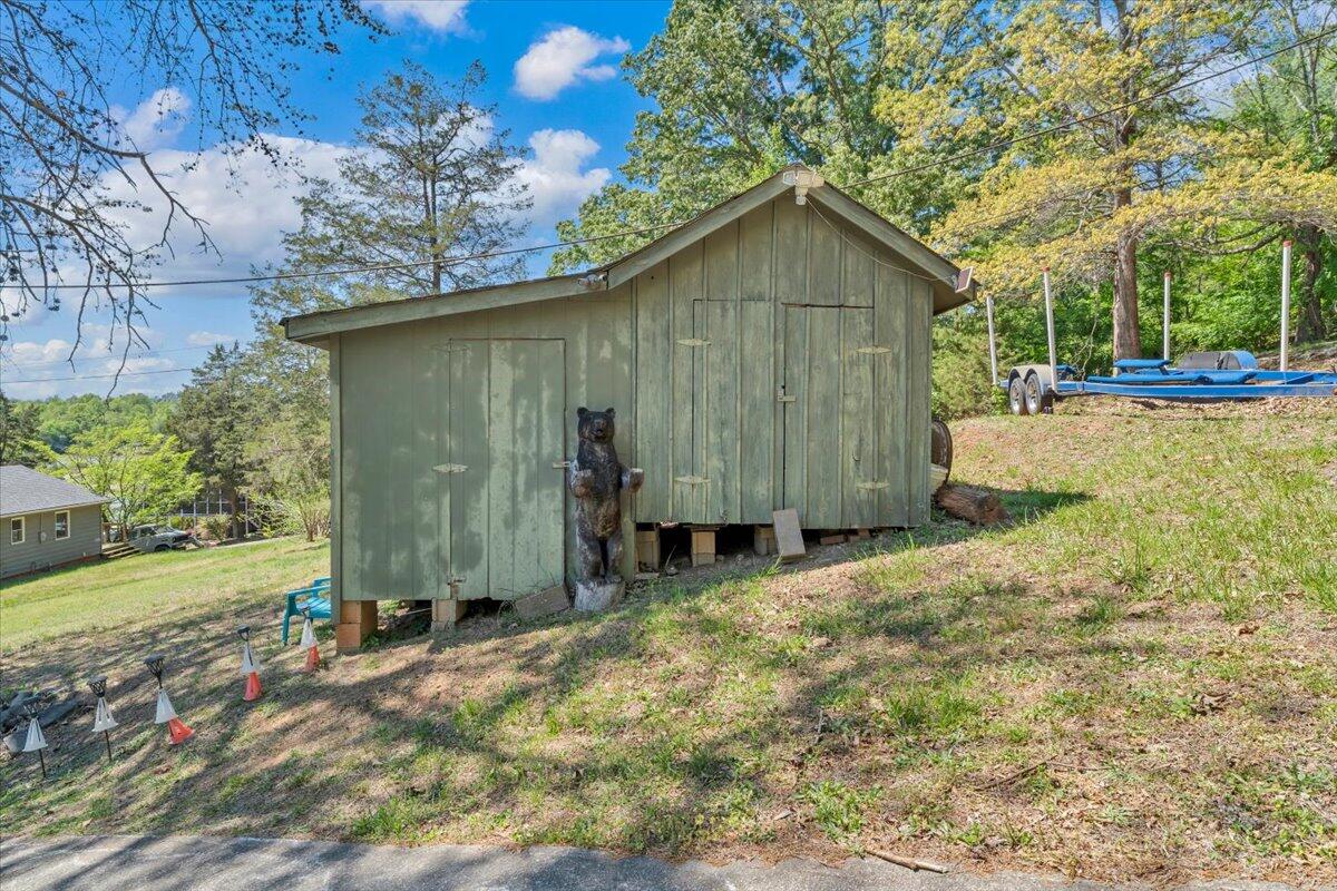 531 Brookwood Road Wirtz, VA 24184 - Photo 52 of 57 a backyard of a house with barbeque oven