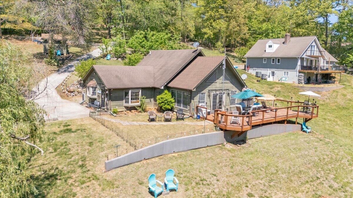 531 Brookwood Road Wirtz, VA 24184 - Photo 54 of 57 a aerial view of a house with swimming pool and sitting area