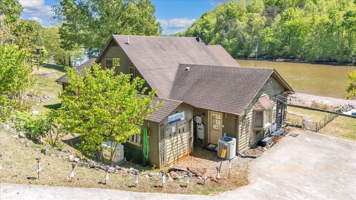 531 Brookwood Road Wirtz, VA 24184 - Photo 56 of 57 a view of a house with a yard and large tree