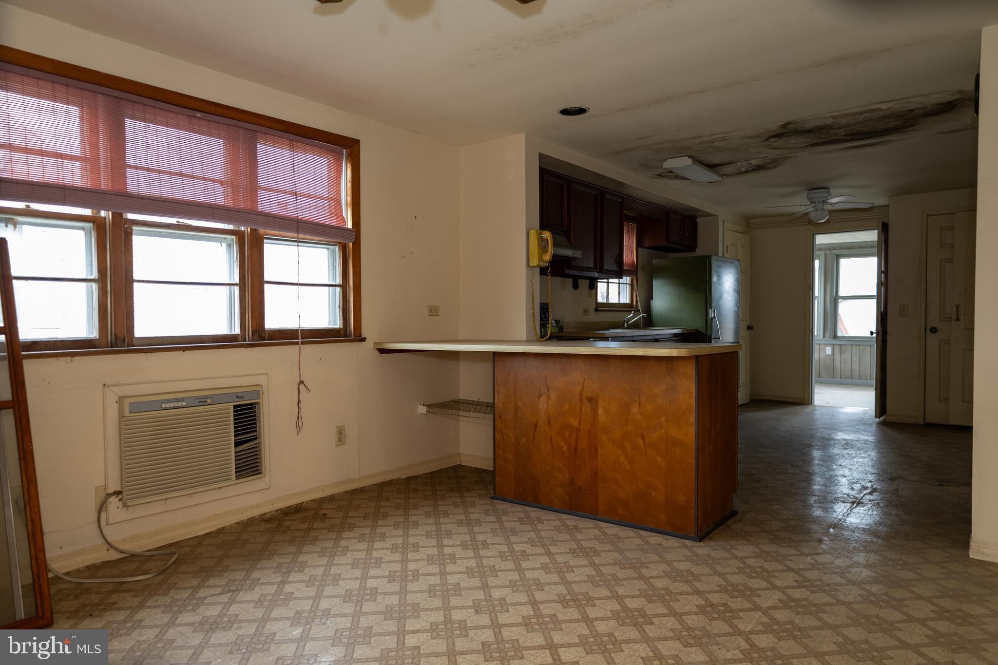 4398 South Bowers Road Milford, DE 19963 - Photo 14 of 54 a kitchen with stainless steel appliances granite countertop a stove a sink and a microwave