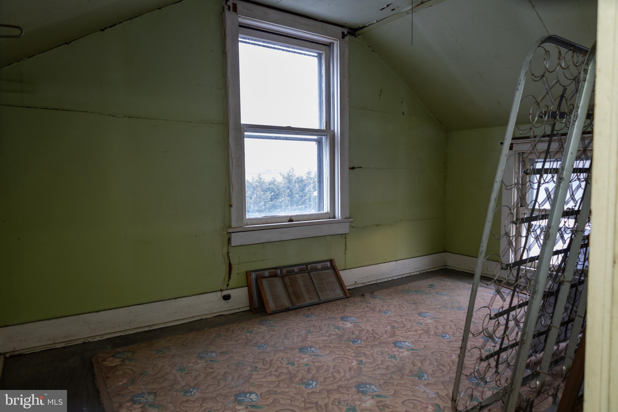 4398 South Bowers Road Milford, DE 19963 - Photo 21 of 54 a view of an empty room with a window