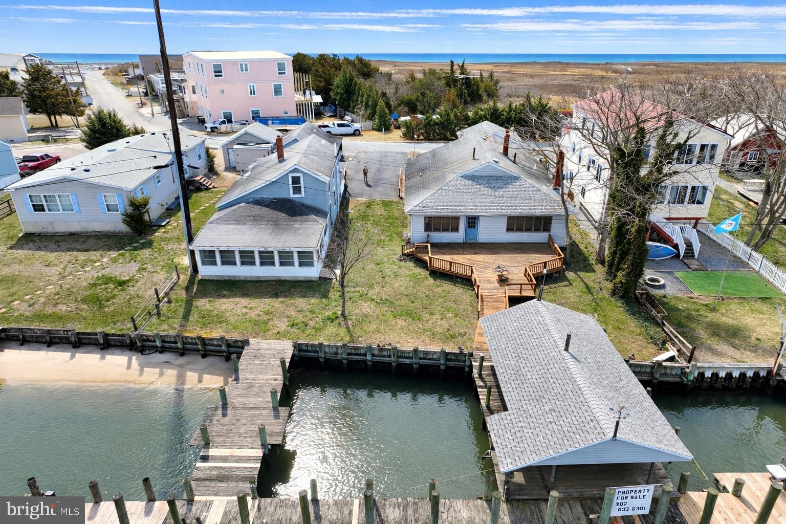4398 South Bowers Road Milford, DE 19963 - Photo 10 of 54 a balcony with table and chairs
