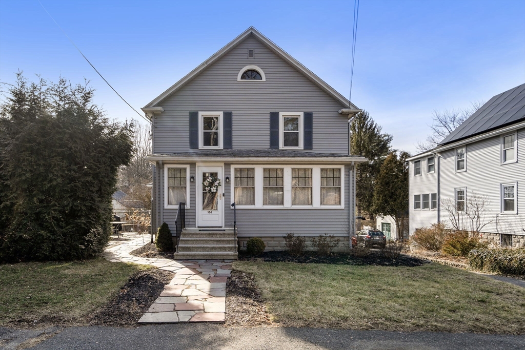 166 Hopedale Street Hopedale, MA 01747 - Photo 1 of 27 a front view of a house with a yard