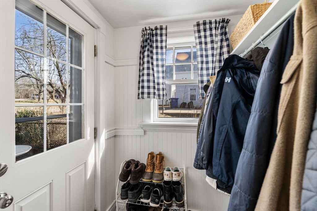 166 Hopedale Street Hopedale, MA 01747 - Photo 11 of 27 a view of walk in closet with clothes and shoes
