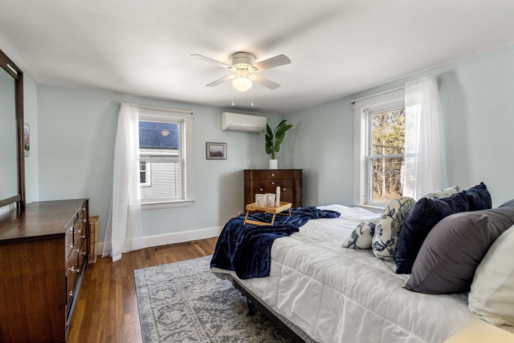 166 Hopedale Street Hopedale, MA 01747 - Photo 15 of 27 a bed room with a bed and a window