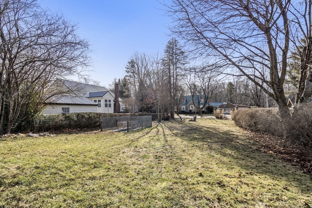166 Hopedale Street Hopedale, MA 01747 - Photo 22 of 27 a view of swimming pool with a yard