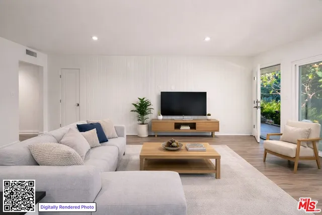a living room with a couch and a fireplace