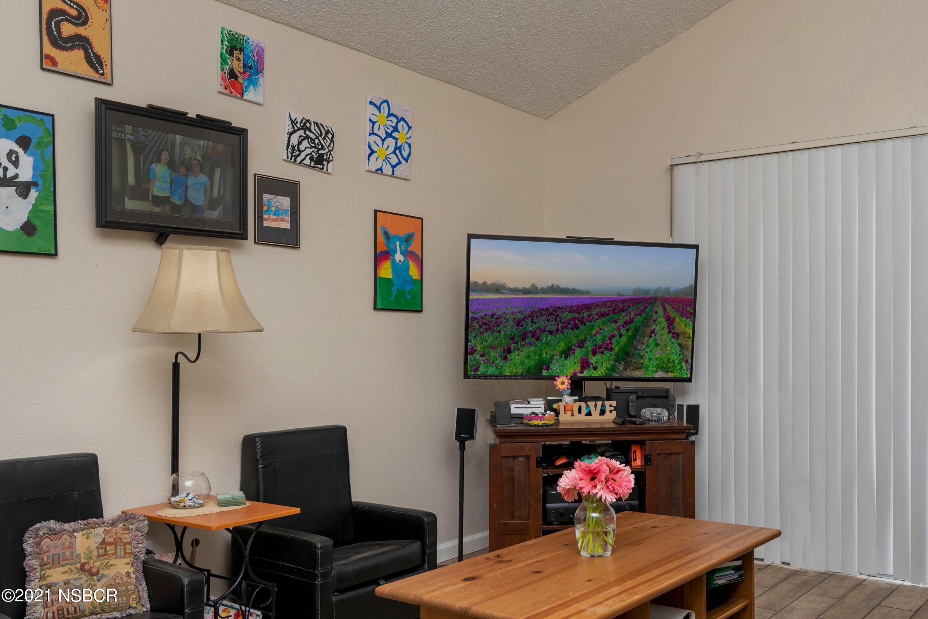 1117 Parkside Way Lompoc, CA 93436 - Photo 5 of 15 a living room with furniture and a flat screen tv