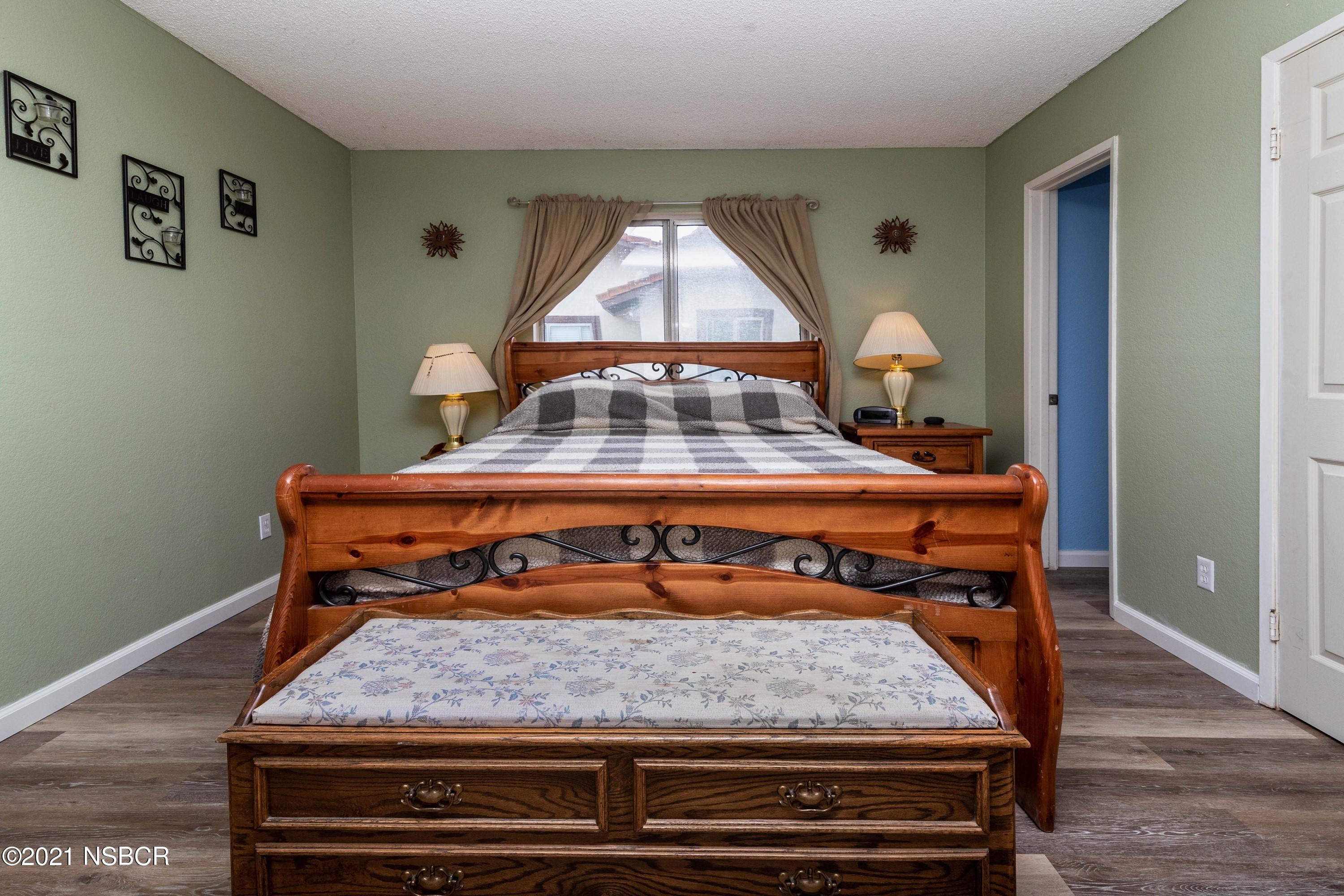 1117 Parkside Way Lompoc, CA 93436 - Photo 8 of 15 a bedroom with a bed and a dresser