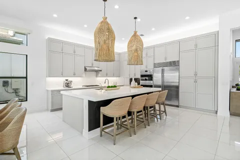 a kitchen with a sink and a window