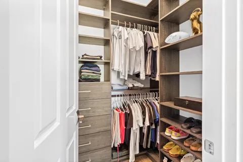 a swimming pool with outdoor seating and yard