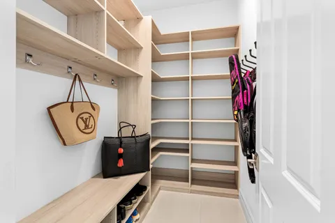 a view of swimming pool with chairs