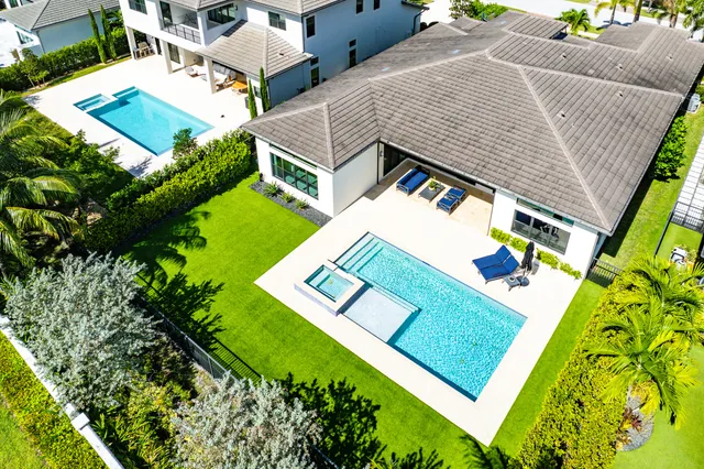 a view of a swimming pool with a lake view