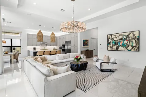 a kitchen with stainless steel appliances a stove sink and microwave