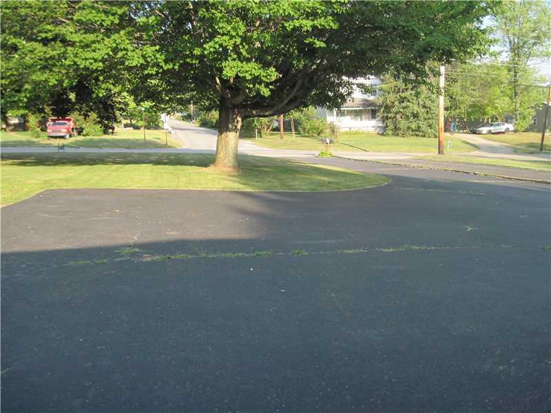 761 Mercer Road Beaver Falls, PA 15010 - Photo 17 of 17 Parking Lot/Garage. Extra parking in front of garage. this view is from garage to Rt. 65