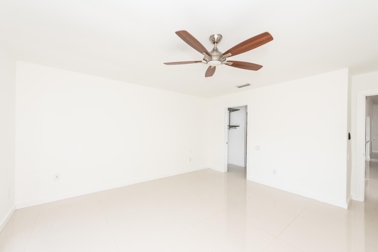 6604 Southwest 114th Place, Unit C72 Miami, FL 33173 - Photo 15 of 28 a view of an empty room